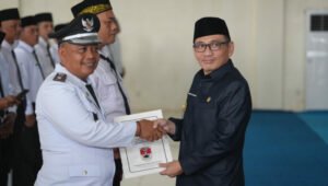 Pj Bupati Mesuji Kukuhkan Perpanjangan Masa Jabatan Kades dan Anggota BPD